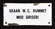 Skaan W.C. Rummet mod griseri