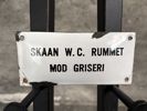 Skaan W.C. Rummet mod griseri